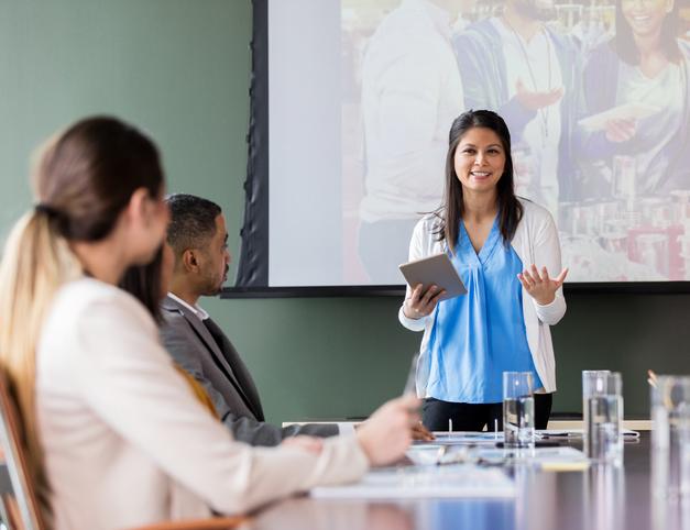 woman presenting at a meeting