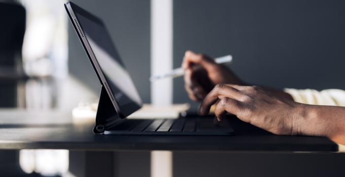 person typing on computer