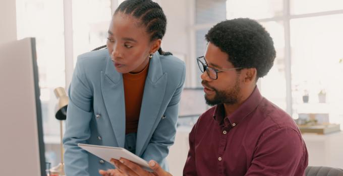 man and woman working together